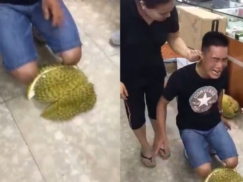 太狠了!男子犯错被老婆揪耳朵 罚跪榴莲哭喊